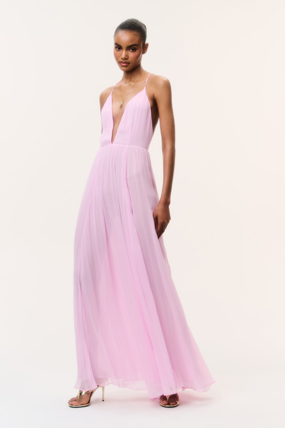 Light pink chiffon maxi dress with plunging V neckline and thin adjustable straps