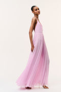 Light pink chiffon maxi dress with open back, thin straps, and gathered waist