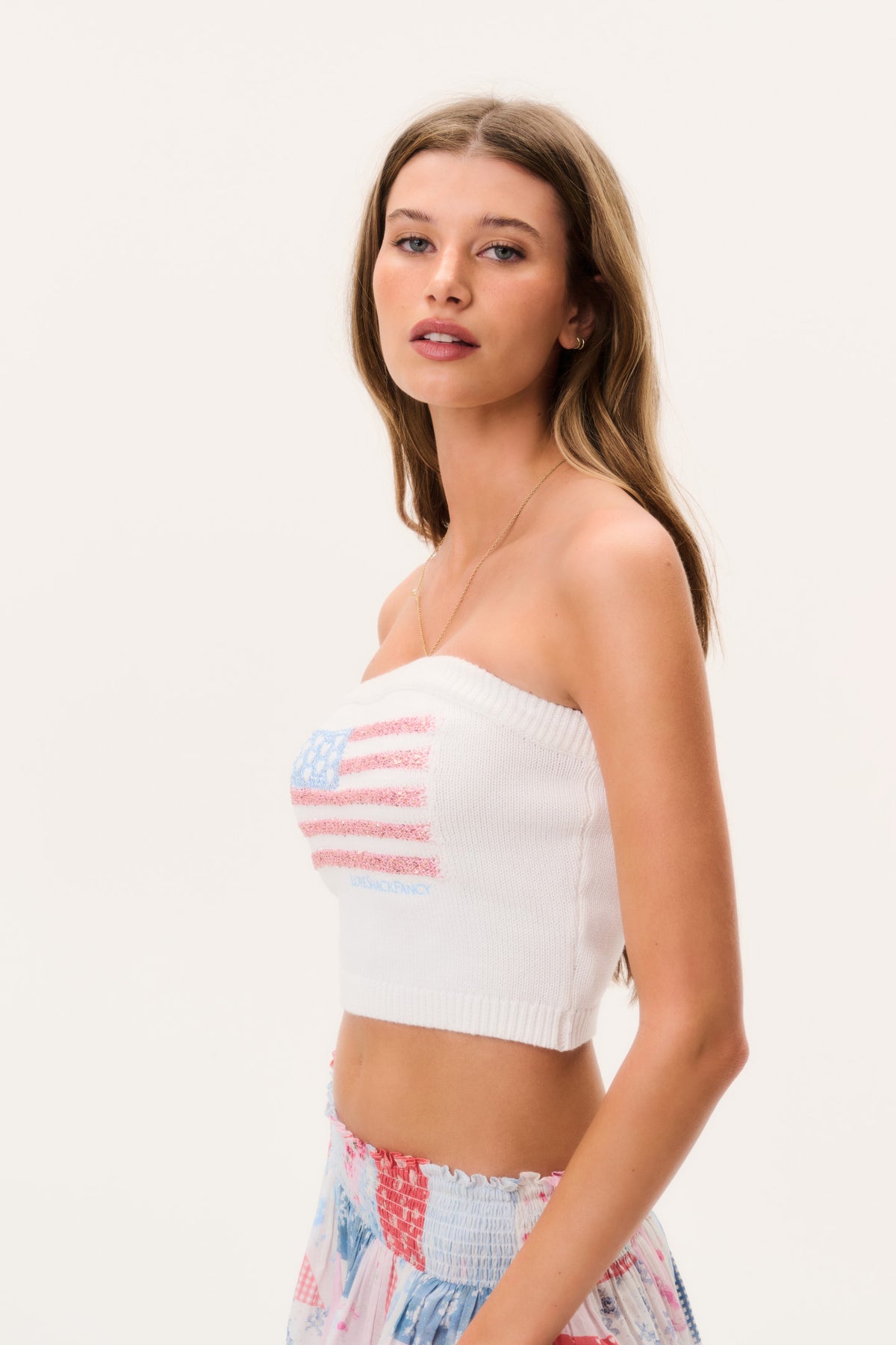 Deserae Sparkle Americana tube top, strapless white knit with blue and red flag stripe print