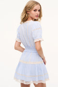 Light blue mini cotton dress with lace-trim neckline, puff sleeves, tiered ruffle skirt