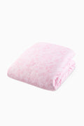 Floral duvet cover and sham set in pink with allover blossom pattern, neatly folded