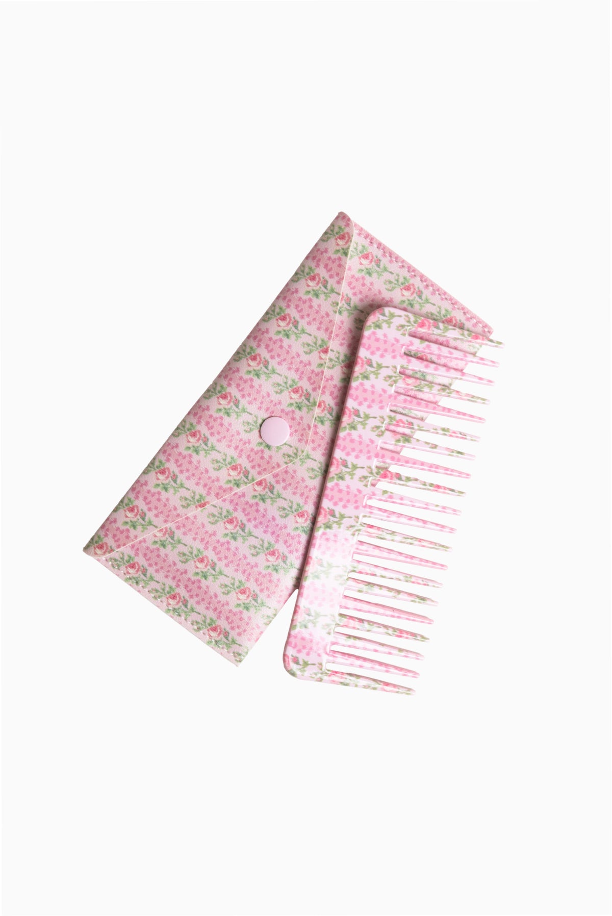 Pink floral hair comb with matching fabric storage case and fine teeth