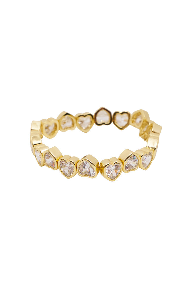Gold-tone stretch bracelet with white heart-shaped stones