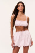 Pink cotton bubble skirt with drawstring waist, gathered ruffle hem