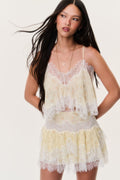 Kellison cotton-silk mini skirt, light yellow lace with scalloped tiers and fringe hem