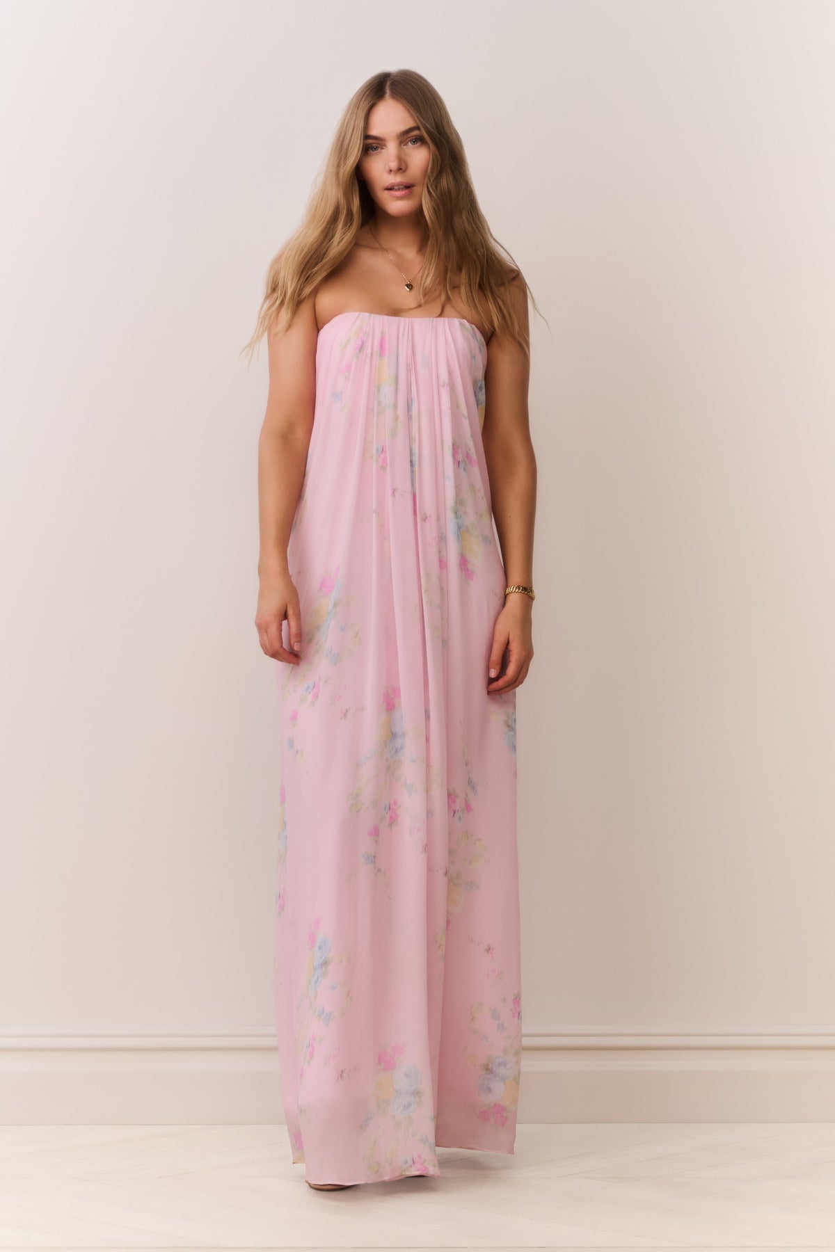 Strapless floral chiffon maxi dress in light pink with scattered pastel blossoms