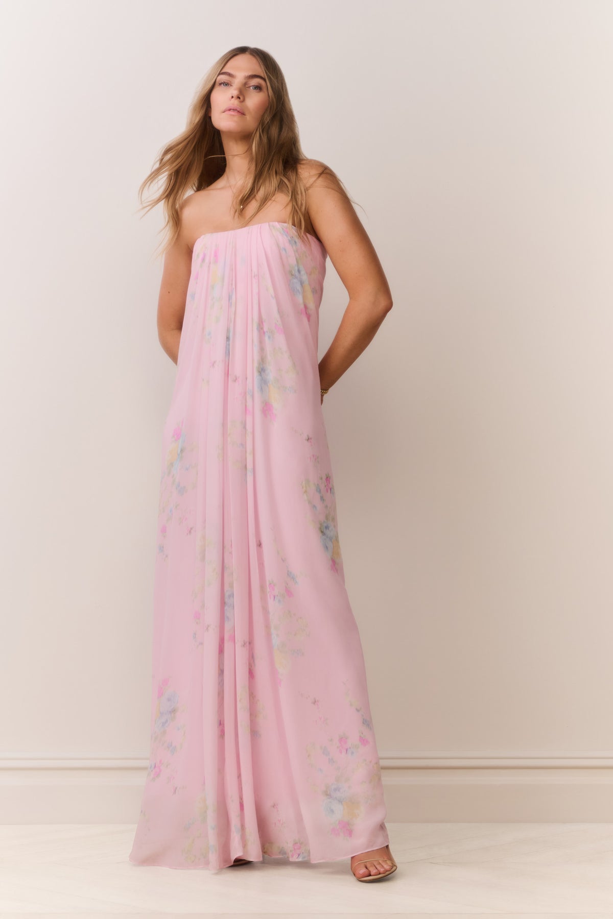 Strapless floral chiffon maxi dress in light pink with pastel blossom print, front view