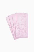 Set of four embroidered linen bow napkins, dusty pink with outline bow pattern