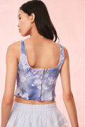 Back of floral denim bustier top in blue, spaghetti straps, squared back neckline