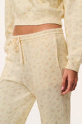 Cream ditsy floral sweatpants close-up of elastic waistband and tied drawstring