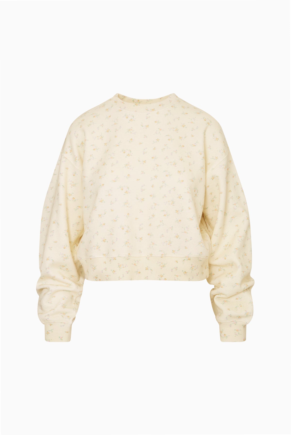 Faint yellow cropped pullover with tiny ditsy floral print, crew neck, long sleeves