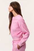 Pink cropped pullover with tiny ditsy floral print, cuffed sleeves, relaxed fit