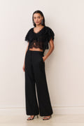 Black lace chiffon cropped top with scalloped neckline and ruffled sleeves, front view