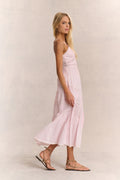 Pink midi cotton dress with spaghetti straps, V-neck, and tiered skirt detail