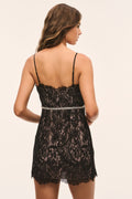 Black lace mini dress, open-back with lace straps and back bow trim