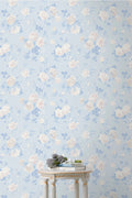 Whisper blue peel-and-stick wallpaper, pale blue and white floral pattern