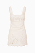 Linen-cotton eyelet mini dress in light ivory with scalloped neckline and hem