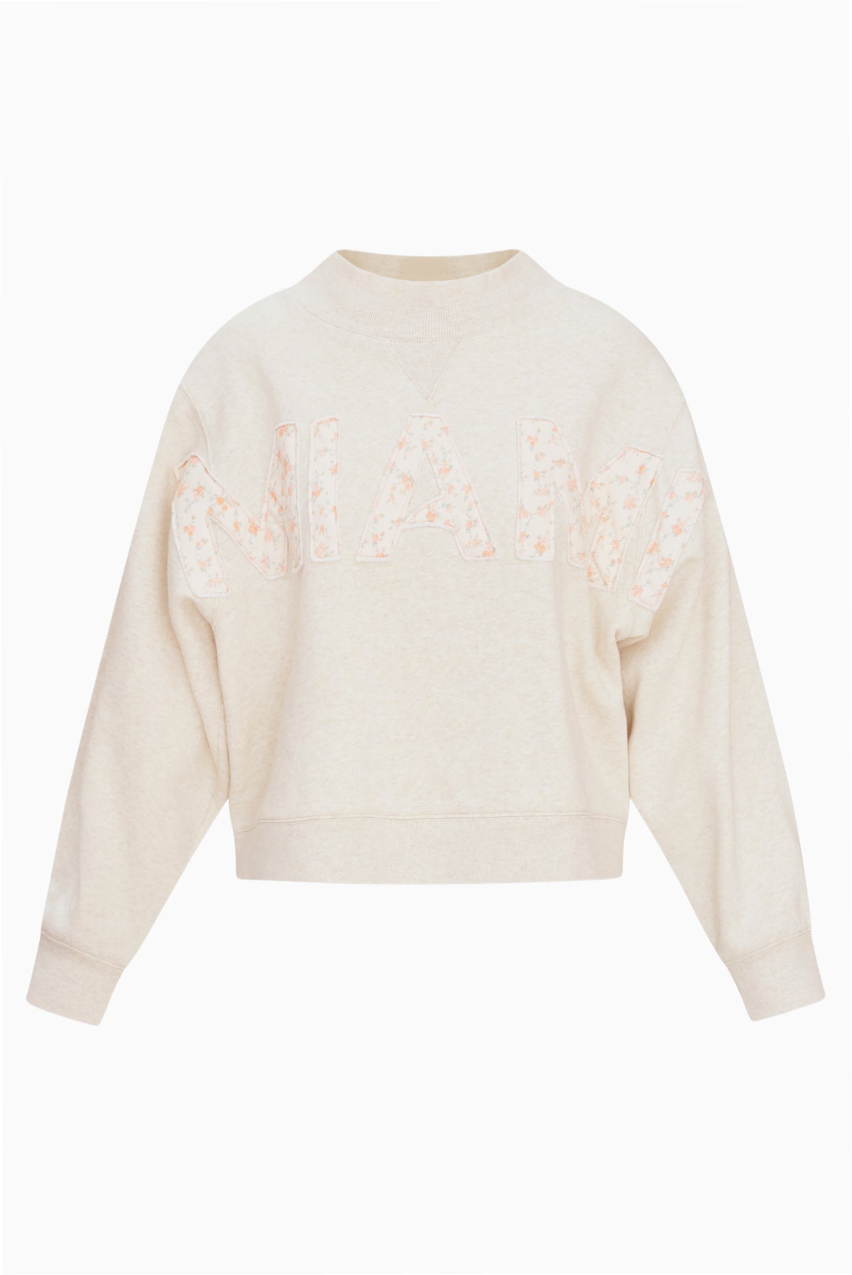 Cream mockneck crew sweatshirt with pink dotted graphic across the chest