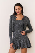 Black sequin stretch knit cardigan with open front, long sleeves, cropped hem