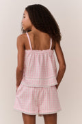 Pink gingham cami top with spaghetti straps and ruffled tiered front