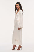 Cream crepe top with lace-trimmed sleeve cuffs and curved lace hem