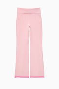 Light pink knit flare pants with foldover waistband and pink trim