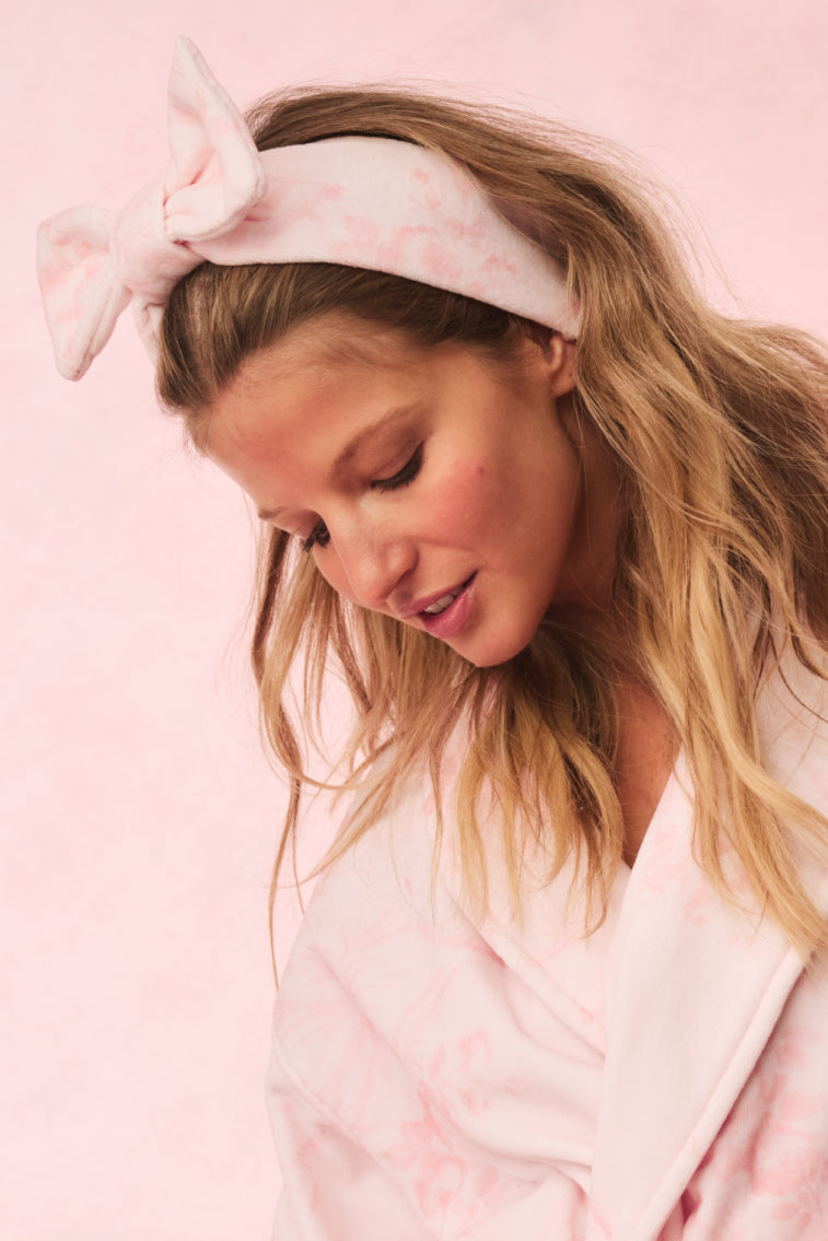 Light pink bow headband with fabric tie, elastic band