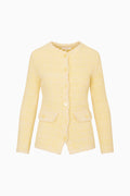 Yellow knit tweed cardigan with button front and two patch pockets, scalloped trim