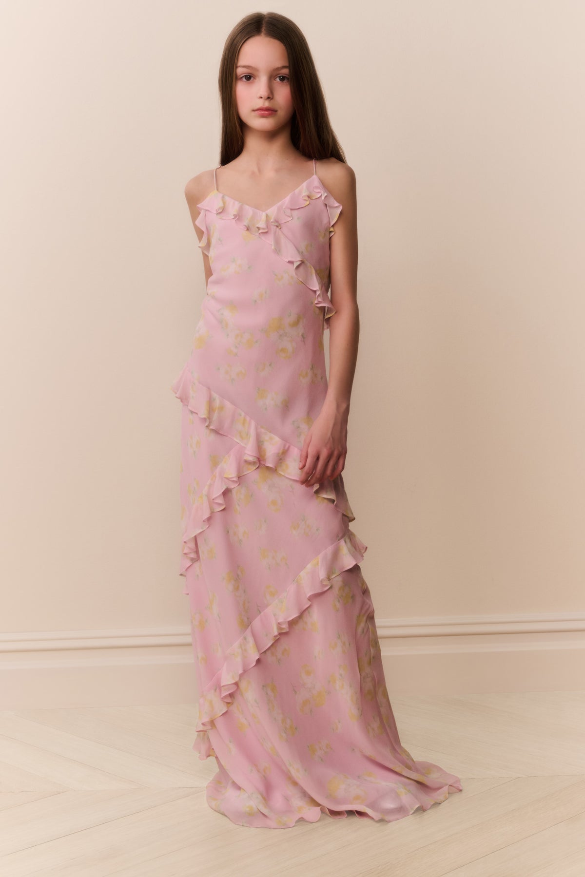 Pink floral chiffon tween dress with V-neckline, thin straps, and layered ruffle skirt