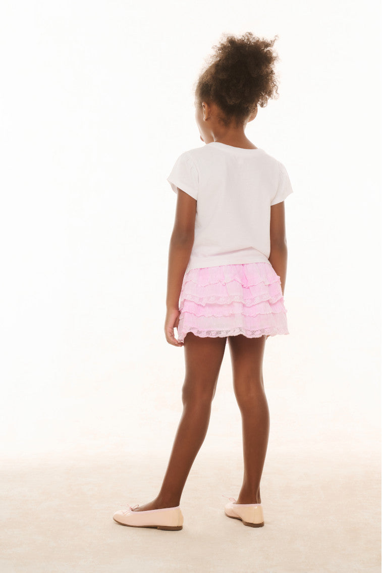 Girls pink tiered ruffle skirt with elastic waistband, back view