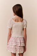 Light pink floral tiered ruffle skirt with layered tiers and gathered hem