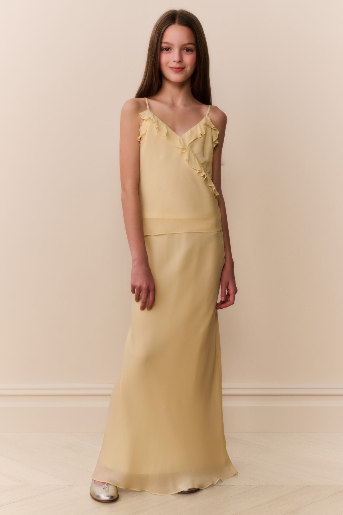 Butter lemon chiffon maxi skirt with straight, flowing drape and low hem