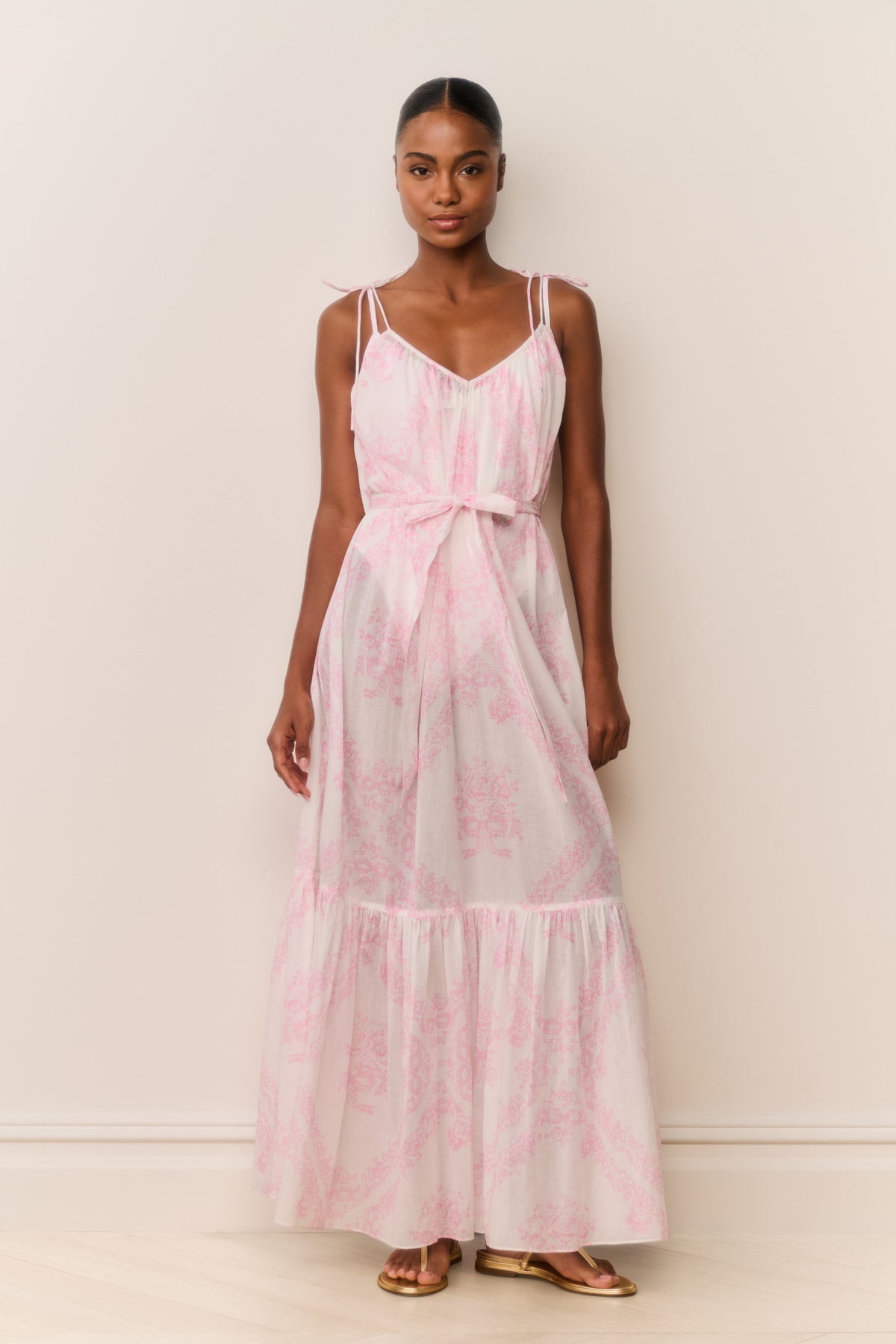 Toile print cover-up dress in pale pink with thin straps and tie waist, tiered skirt