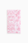 Pink cotton hand towel with all-over floral pattern