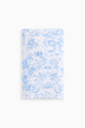 Light blue cotton hand towel with all-over floral pattern