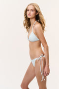 Light blue ditsy floral bikini set with halter triangle top and side-tie bottoms, side view