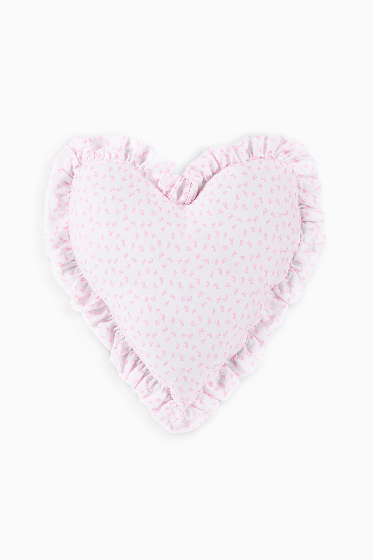 Heart-shaped ruffle pillow in pink with tiny floral pattern