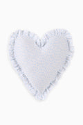 Heart-shaped ruffle pillow in light blue with tiny dotted floral pattern