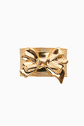 Antique gold bow napkin ring with textured ribbon detail