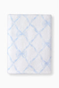 White bath towel with light blue diamond lattice print