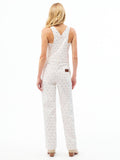 Women’s ecru patterned overall from behind with V-back straps and leg seams