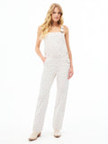 Women’s ecru overall with blue micro-print, square neckline and wide straight legs