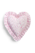 Heart-shaped ruffle pillow in pale pink with small floral print