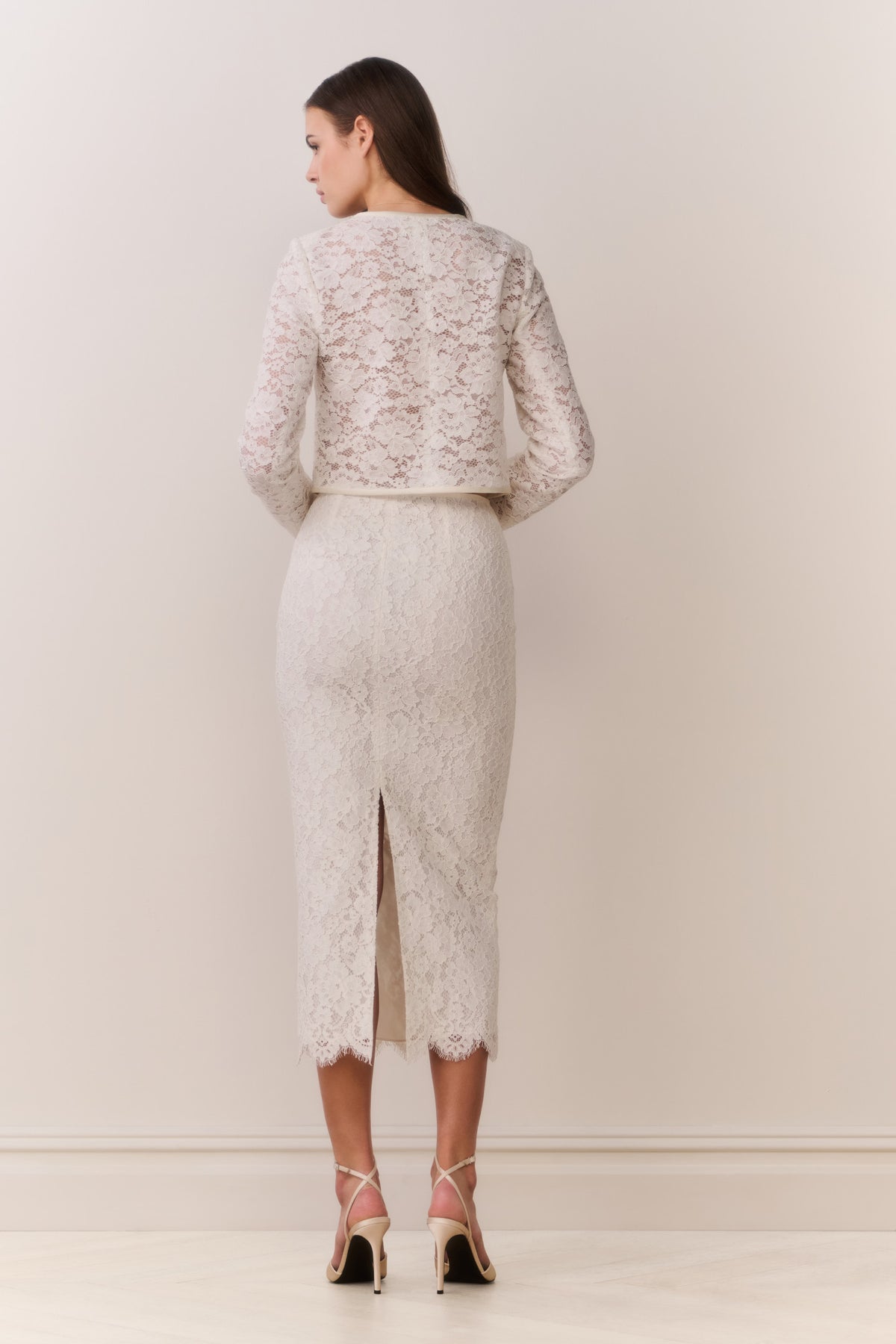 Ivory lace midi pencil skirt with center-back slit and scalloped hem
