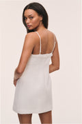 Ivory tweed mini dress with lace-trimmed scoop back and thin spaghetti straps