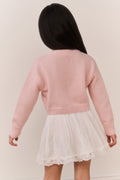 Girls pink cardigan back view, ribbed hem and cuffs with button placket