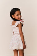Girls floral cotton mini skirt, light ivory with small floral print and ruffled hem