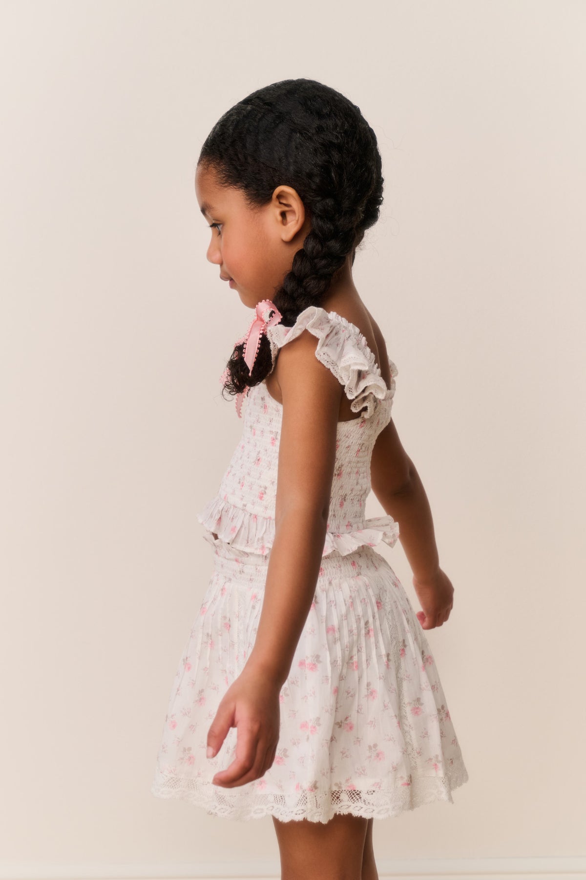 Girls floral cotton mini skirt, light ivory with gathered waist and tiered ruffle hem