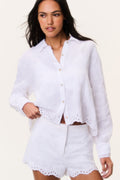 White linen eyelet shorts with scalloped hemline and eyelet embroidery