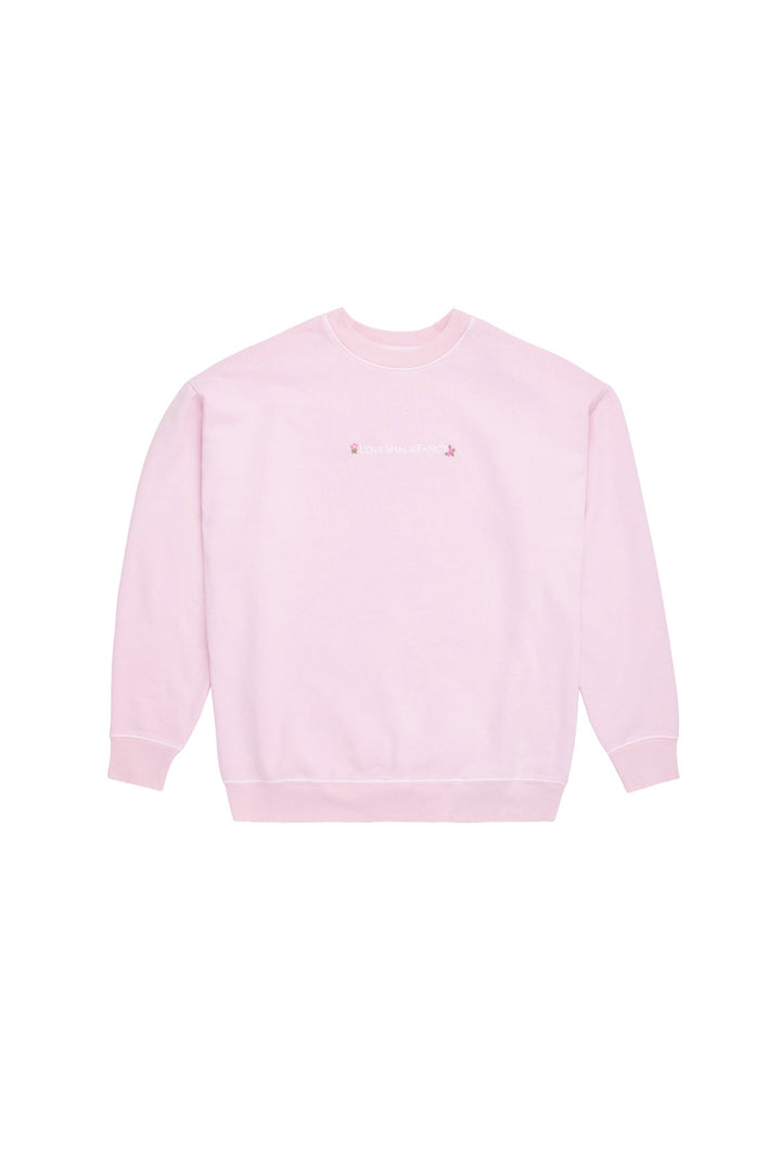 Light pink crewneck pullover sweatshirt with small chest logo graphic